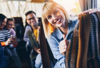 Happy passengers traveling by bus.